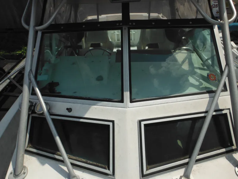 Slide: The Image of 1988 Grady-White Offshore 240 boat windshield and cockpit view. - 44