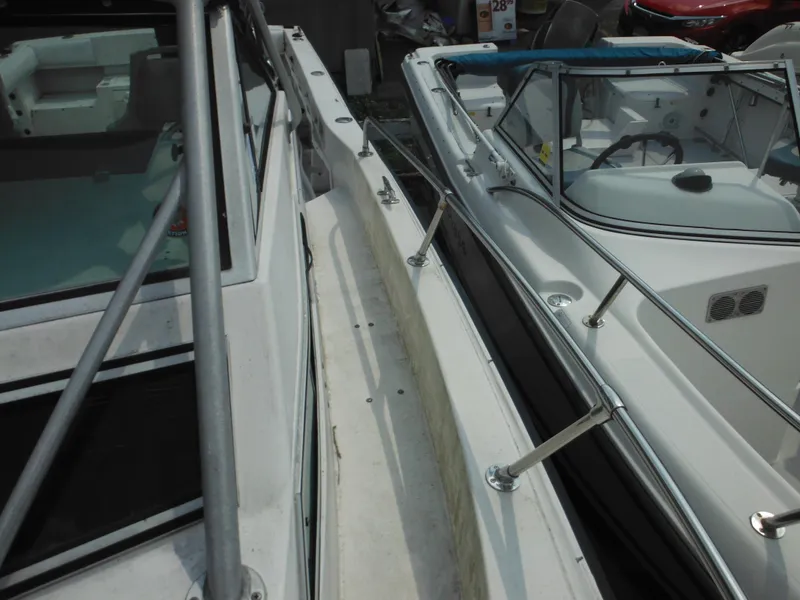 Slide: The Image of 1988 Grady-White Offshore 240 boats side by side, showcasing deck and railings. - 46