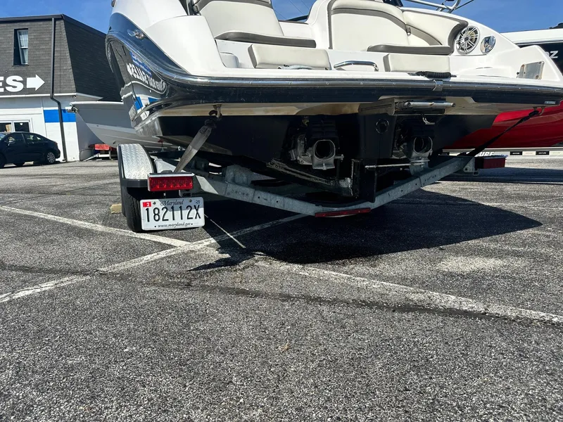 Slide: The Image of 2016 Yamaha Boats 242 Limited S E-Series on trailer in parking lot. - 12