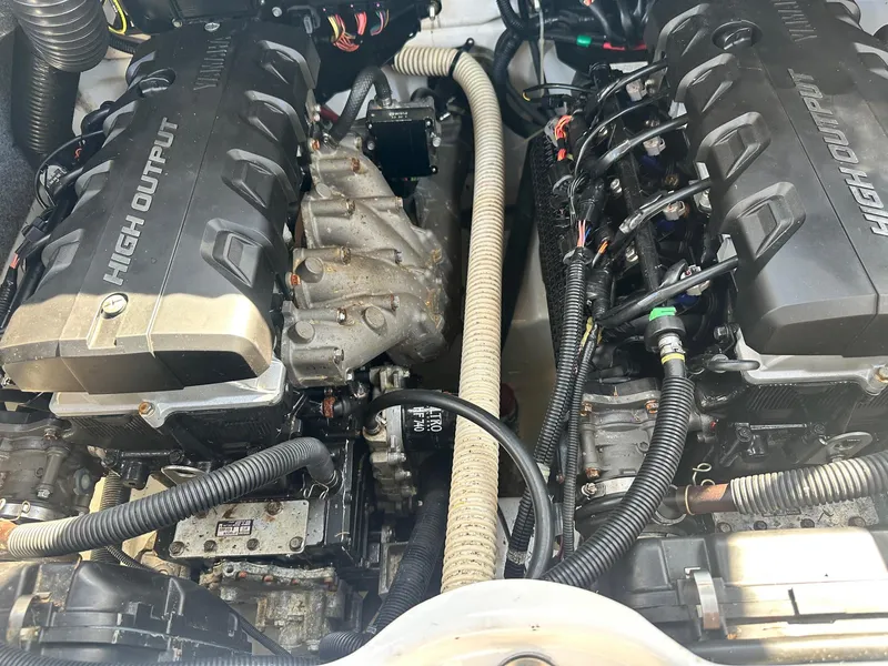 Slide: The Image of 2016 Yamaha Boats 242 Limited S E-Series engine compartment with high output engines. - 17