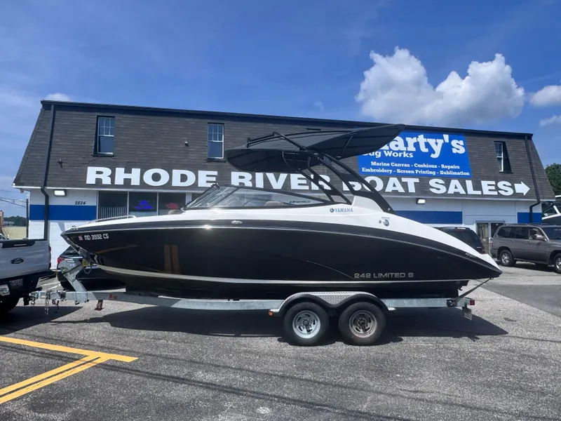Slide: The Image of 2016 Yamaha 242 Limited S E-Series boat on trailer at Rhode River Boat Sales. - 2