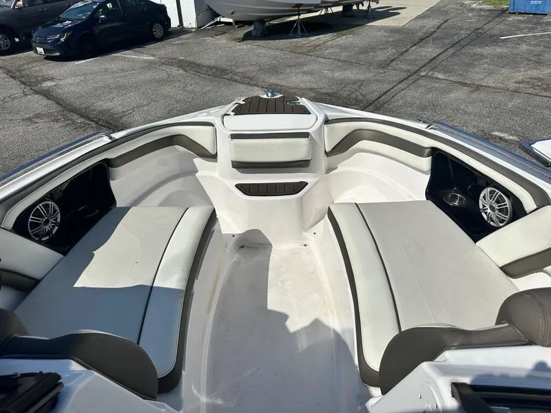 Slide: The Image of 2016 Yamaha Boats 242 Limited S E-Series interior with spacious seating and sleek design. - 28
