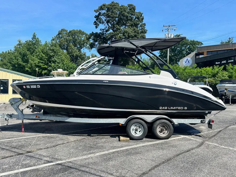 Slide: The Image of 2016 Yamaha Boats 242 Limited S E-Series on trailer, parked outdoors. - 3