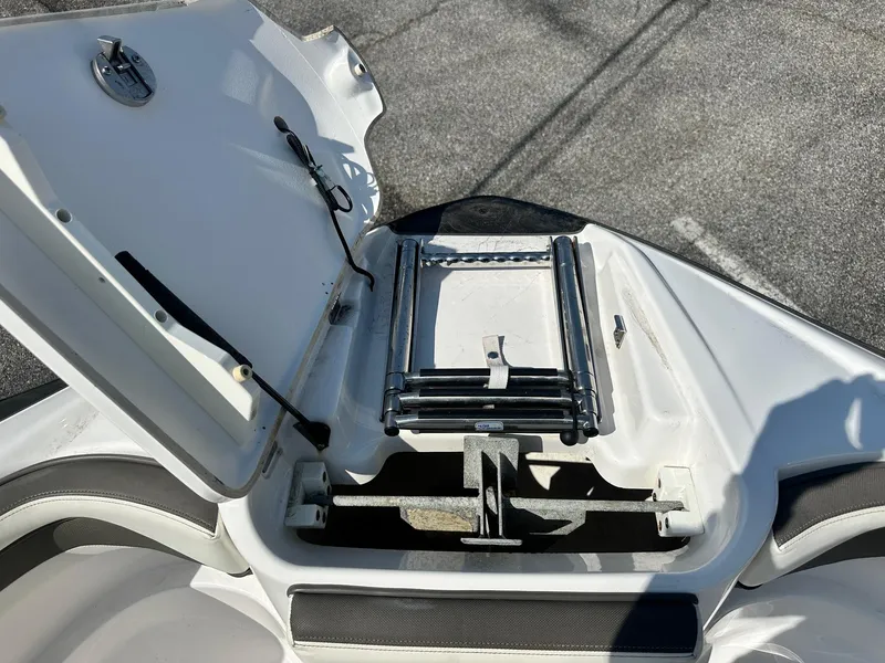Slide: The Image of Yamaha 242 Limited S E-Series 2016 boat ladder compartment, open view. - 33