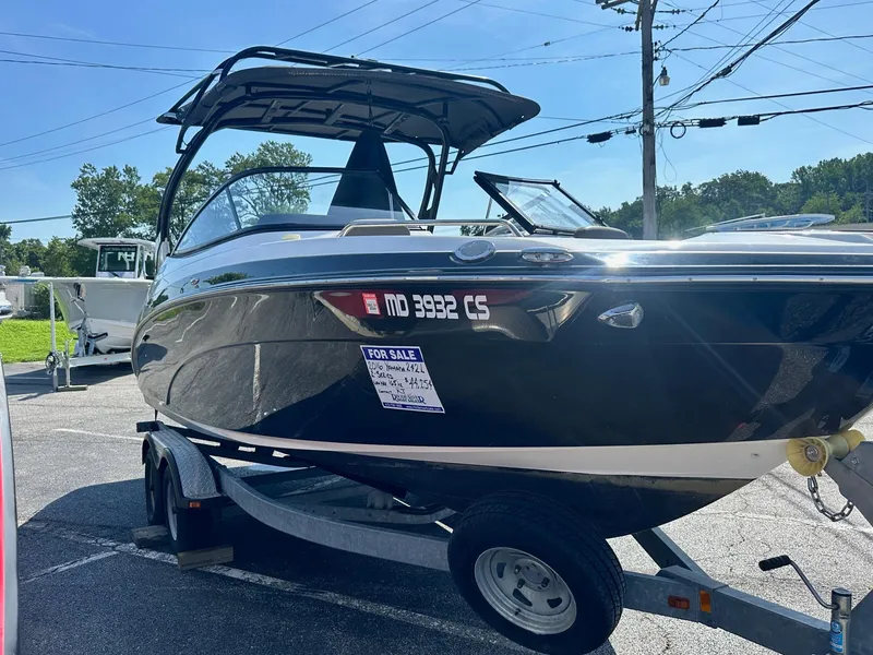 Slide: The Image of 2016 Yamaha Boats 242 Limited S E-Series on trailer, for sale in parking lot. - 6