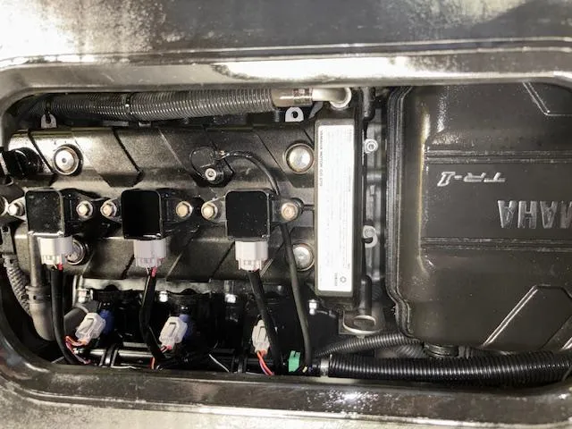 Slide: The Image of Engine components of a 2020 Yamaha WaveRunner EXR, showcasing intricate mechanical details. - 12