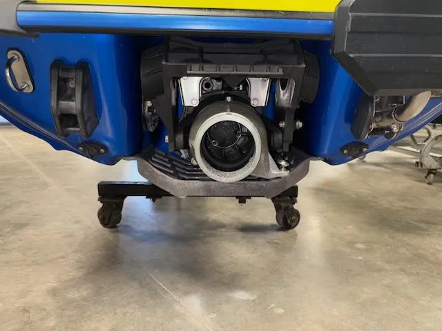 Slide: The Image of 2020 Yamaha WaveRunner EXR jet propulsion system, blue and yellow, on display indoors. - 13