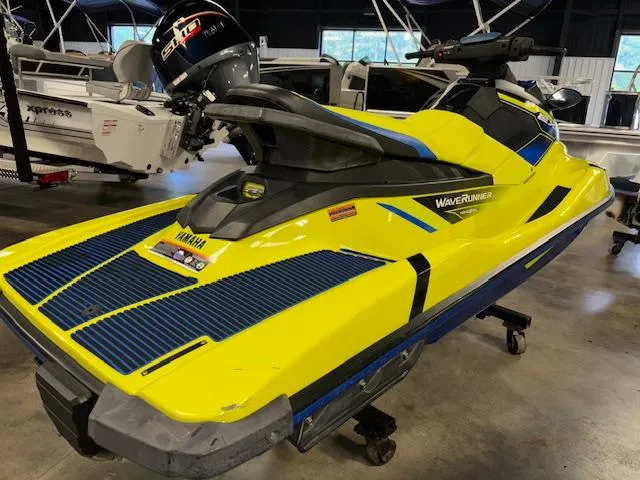 Slide: The Image of 2020 Yamaha WaveRunner EXR in vibrant yellow, displayed indoors on a stand. - 7