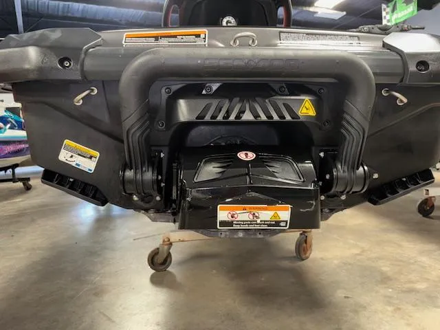 Slide: The Image of 2023 Sea-Doo GTI SE rear view showcasing engine and exhaust system. - 16