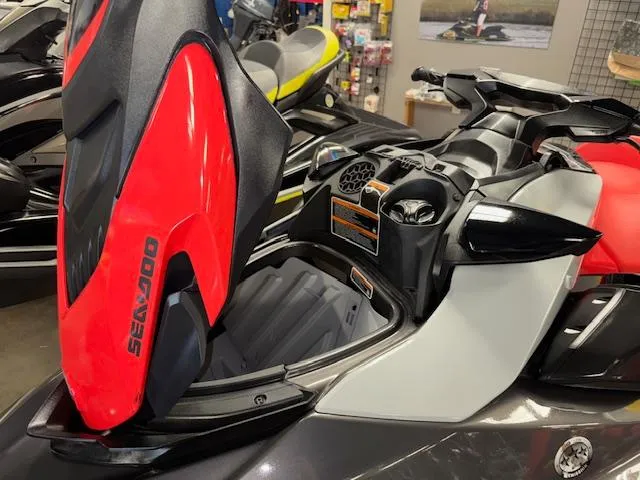 Slide: The Image of 2023 Sea-Doo GTI SE jet ski with open storage compartment, showcasing sleek design. - 19