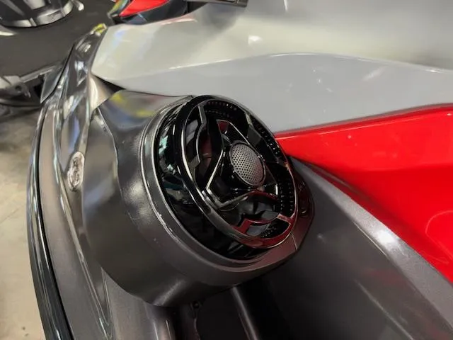 Slide: The Image of 2023 Sea-Doo GTI SE jet ski with sleek black speaker detail. - 4