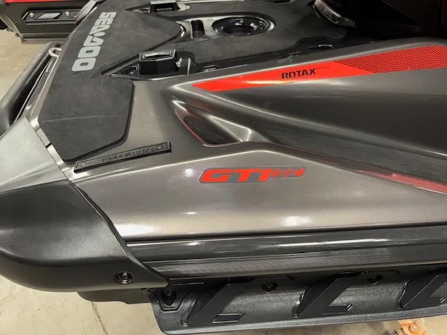 Slide: The Image of 2023 Sea-Doo GTI SE jet ski with Rotax engine, sleek design, and modern features. - 9