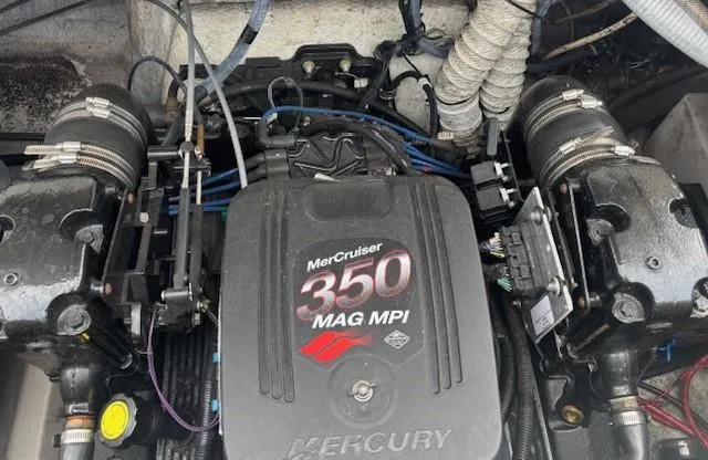 Slide: The Image of MerCruiser 350 MAG MPI engine in 2006 Rinker 232 Captiva Bowrider boat. - 8