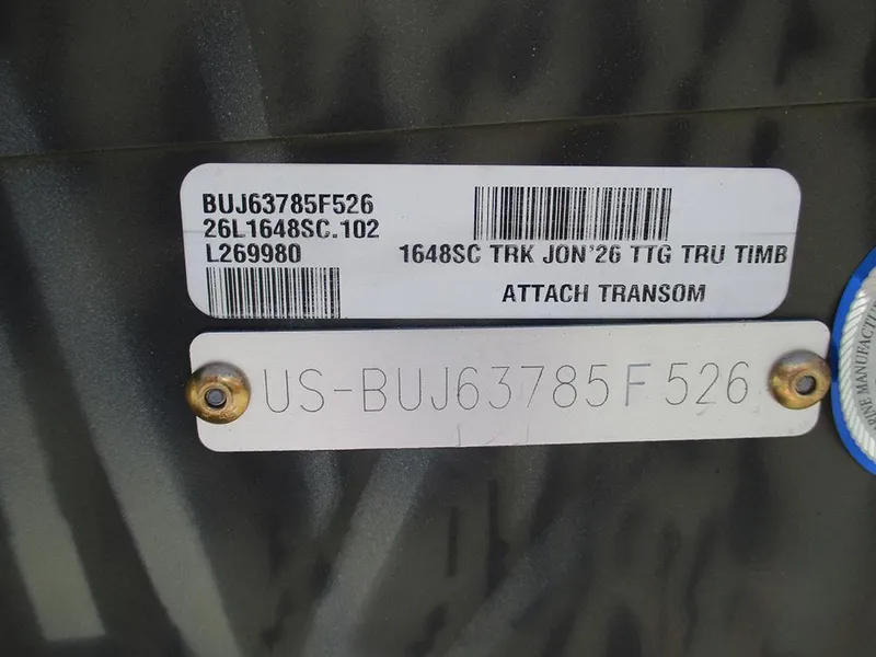 Slide: The Image of Serial number plate on 2026 Tracker Grizzly 1648 SC boat transom. - 19