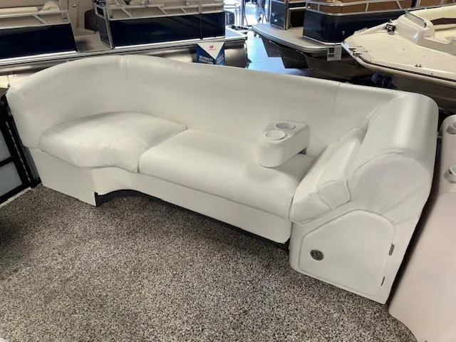 Slide: The Image of White leather seating on AquaPatio AP220R boat, 2002 model, with cup holder. - 12