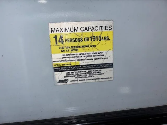 Slide: The Image of Capacity label on 2002 AquaPatio AP220R boat, max 14 persons or 1915 lbs. - 22