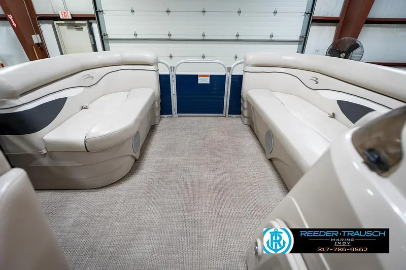 Slide: The Image of Interior of a 2019 Bennington 18 SLV pontoon boat with beige seating. - 19