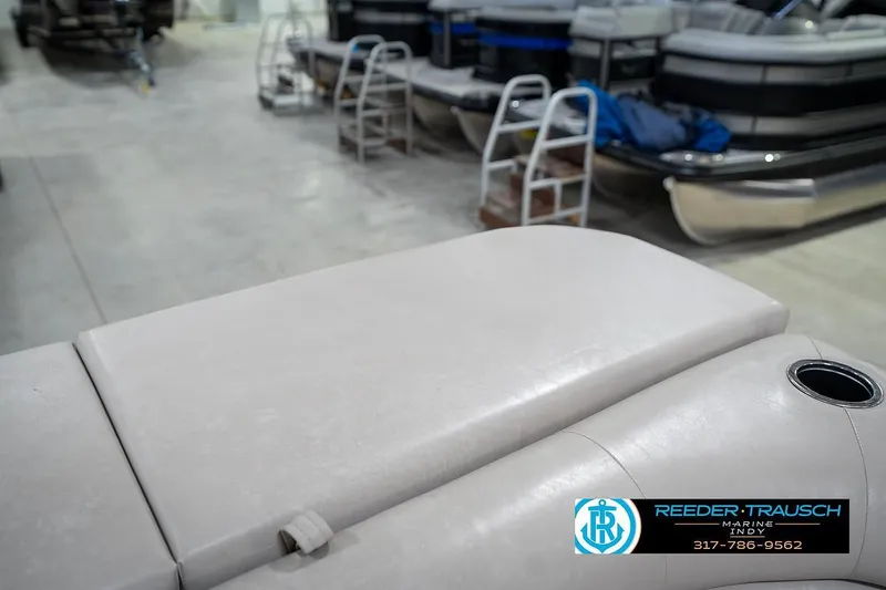 Slide: The Image of 2019 Bennington 18 SLV pontoon boat interior with seating and cup holder. - 27