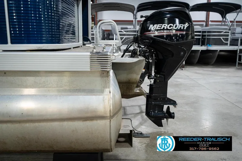 Slide: The Image of 2019 Bennington 18 SLV pontoon boat with Mercury outboard motor in showroom. - 42