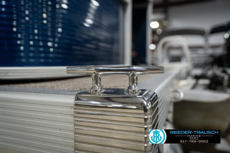 Slide: The Image of 2019 Bennington 18 SLV boat cleat detail in showroom setting. - 49