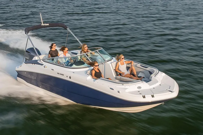 Slide: The Image of Manufacturer Provided Image: 2021 Hurricane SunDeck 2400 OB boat cruising with passengers on a sunny day. - 3