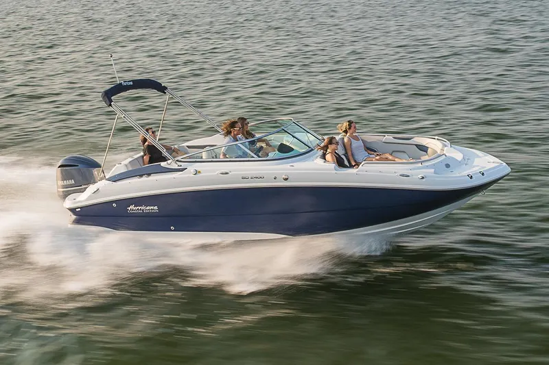 Slide: The Image of Manufacturer Provided Image: 2021 Hurricane SunDeck 2400 OB boat cruising on water with passengers. - 4