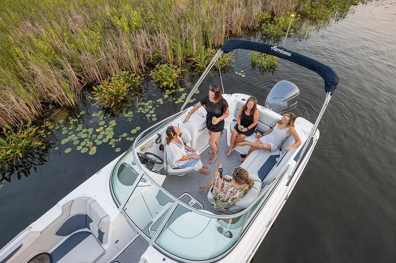 Slide: The Image of Manufacturer Provided Image: 2021 Hurricane SunDeck 2400 OB boat with people enjoying a day on the water. - 8