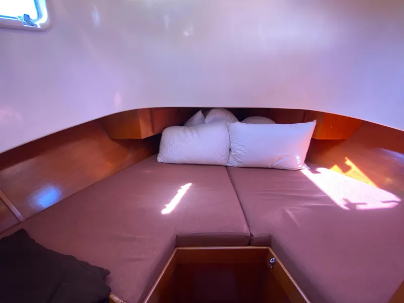 Slide: The Image of Cozy cabin interior of 1986 Transpacific Marine Eagle yacht with cushions and wooden finish. - 20