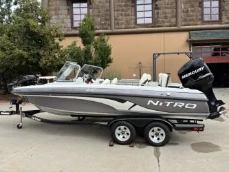 Slide: The Image of 2011 Nitro Z 290 Sport boat with Mercury engine on trailer. - 3
