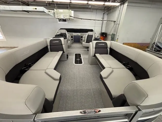 Slide: The Image of 2025 Harris Cruiser 230 CWDH pontoon boat interior with spacious seating and modern design. - 15