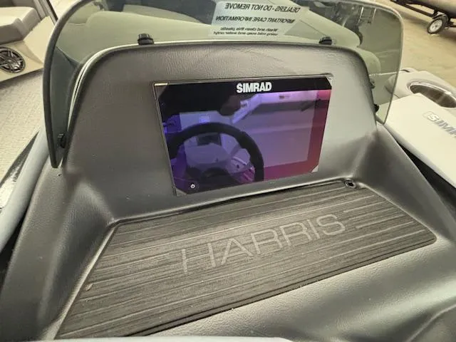 Slide: The Image of Dashboard of 2025 Harris Cruiser 230 CWDH with Simrad display. - 5