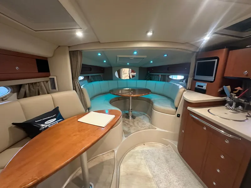 Slide: The Image of Interior of 2004 Chaparral Signature 330 yacht with elegant seating and modern amenities. - 13