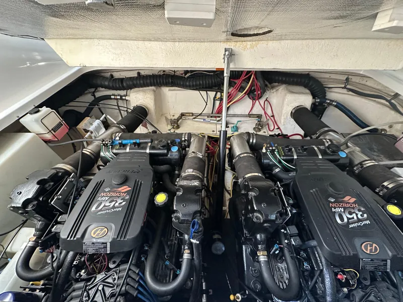 Slide: The Image of 2004 Chaparral Signature 330 engine compartment with dual MerCruiser 350 MPI Horizon engines. - 21