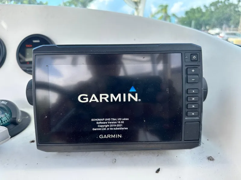 Slide: The Image of Garmin ECHOMAP UHD 73sv on 2001 Sailfish 234 WAC boat dashboard. - 19
