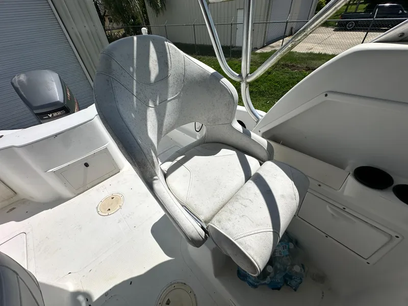 Slide: The Image of Captain's chair on 2001 Sailfish 234 WAC boat, with Yamaha V225 engine visible. - 20
