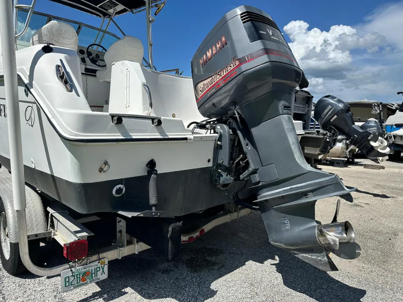 Slide: The Image of 2001 Sailfish 234 WAC boat with Yamaha outboard motor on trailer. - 8