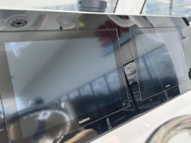 Slide: The Image of 2026 Sportsman Heritage 231 Center Console with Garmin displays on the dashboard. - 15