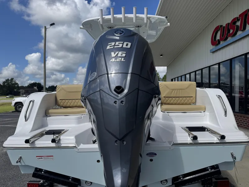 Slide: The Image of 2026 Sportsman Heritage 231 Center Console boat with powerful 250 V6 engine. - 32