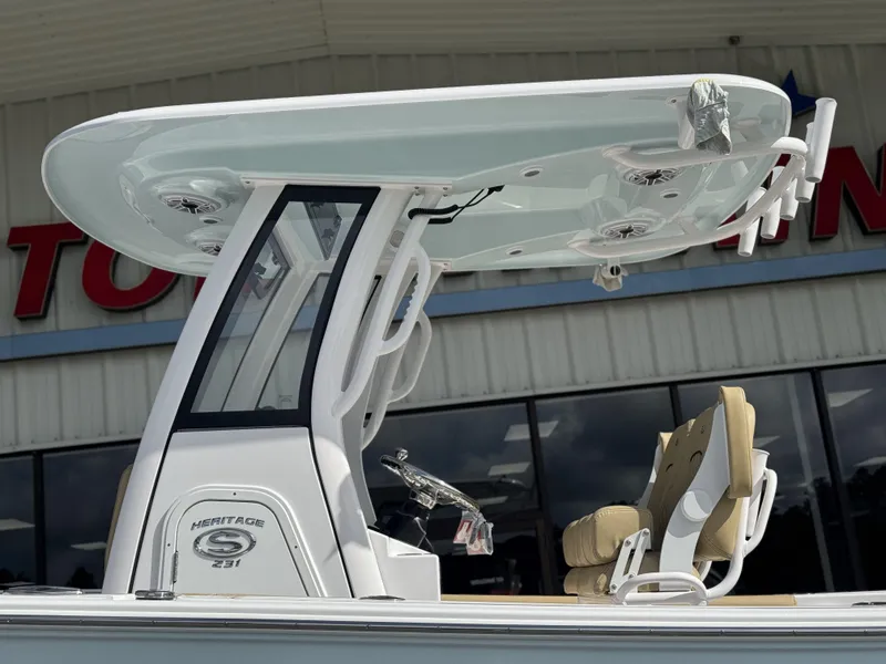 Slide: The Image of 2026 Sportsman Heritage 231 Center Console boat with T-top and seating. - 8