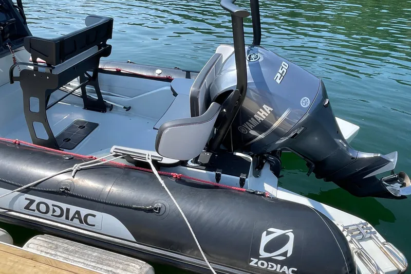 Slide: The Image of 2022 Zodiac Open 7 boat with Yamaha 250 engine on calm water. - 13