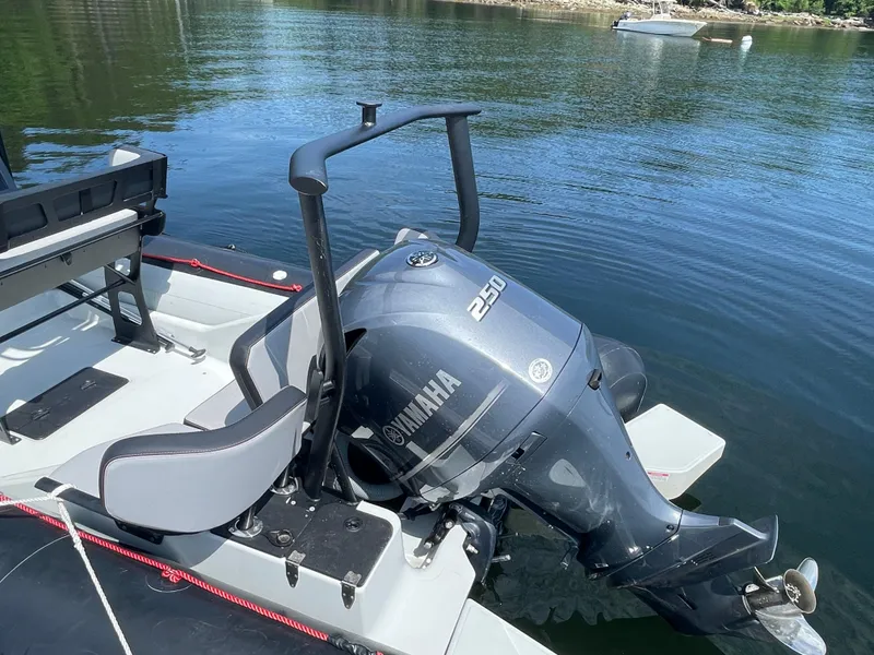 Slide: The Image of 2022 Zodiac Open 7 boat with Yamaha 250 outboard motor on calm water. - 24