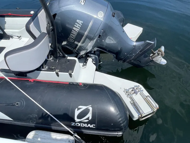 Slide: The Image of 2022 Zodiac Open 7 boat with Yamaha engine on water. - 25