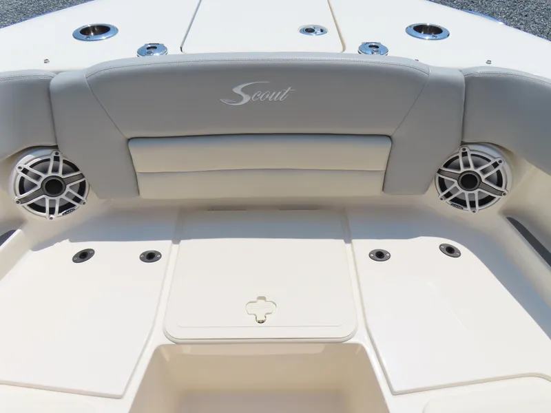 Slide: The Image of 2022 Scout 255 Dorado boat interior with speakers and seating. - 14