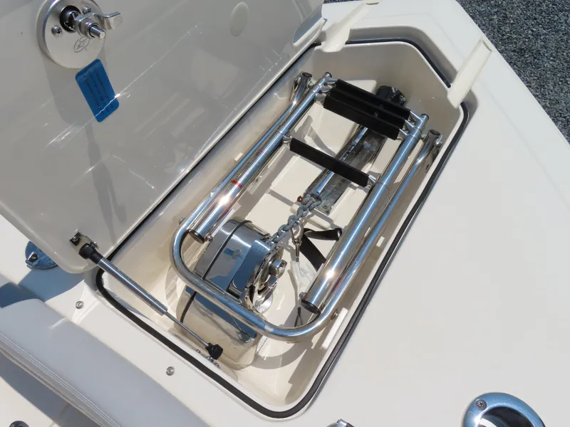 Slide: The Image of 2022 Scout 255 Dorado boat ladder compartment with stainless steel hardware. - 19