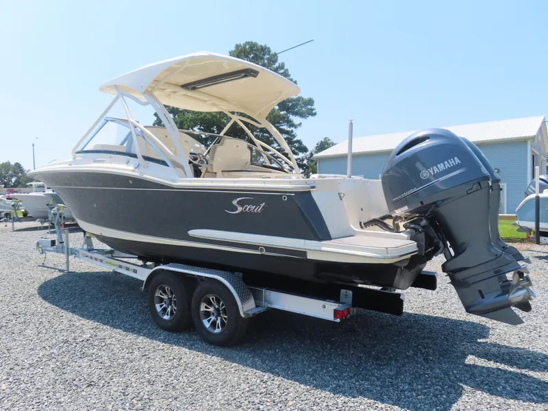 Slide: The Image of 2022 Scout 255 Dorado boat on trailer with Yamaha outboard motor. - 2