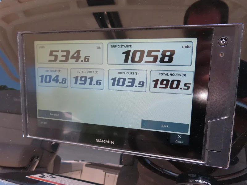 Slide: The Image of Garmin display on 2022 Scout 255 Dorado showing fuel usage and trip distance. - 29