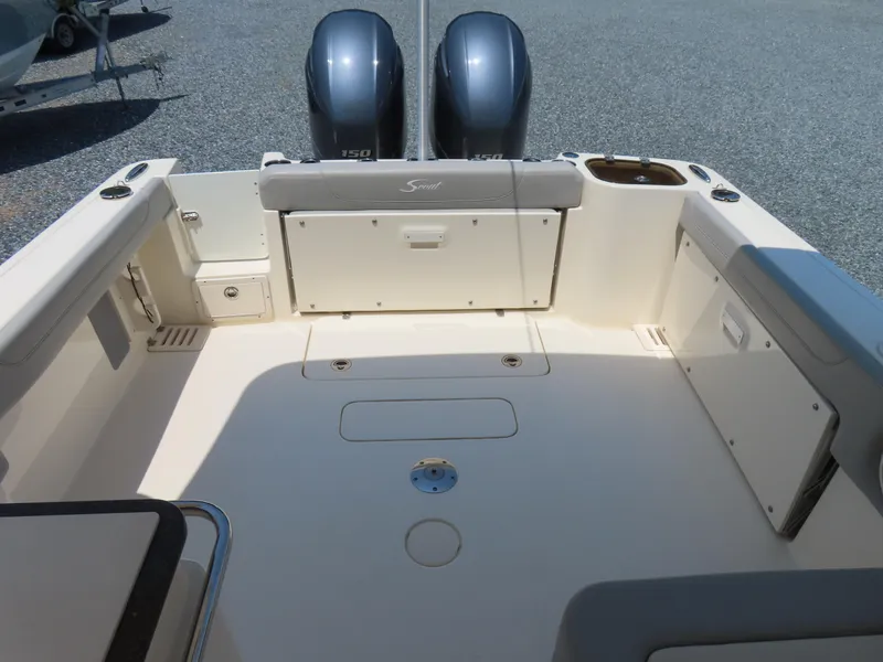 Slide: The Image of 2022 Scout 255 Dorado boat interior with dual engines and spacious deck. - 41