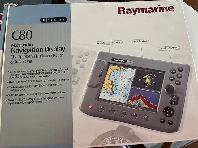 Slide: The Image of Raymarine C80 multifunction navigation display box with chartplotter, fishfinder, and radar features. - 38