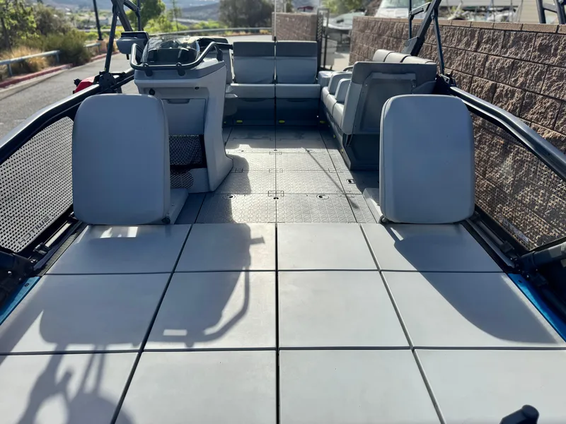 Slide: The Image of 2023 Sea-Doo Switch Sport 18 interior with spacious seating and modern design. - 11