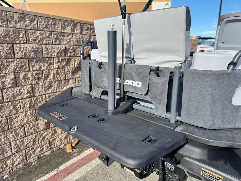 Slide: The Image of 2023 Sea-Doo Switch Sport 18 rear deck with seating and storage compartments. - 7